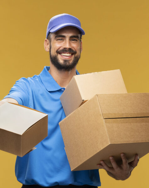 portrait-delivery-man-handing-out-parcel